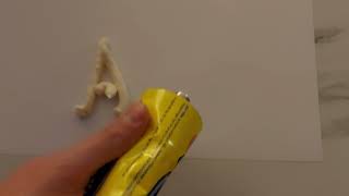 Writing my name with cream cheese