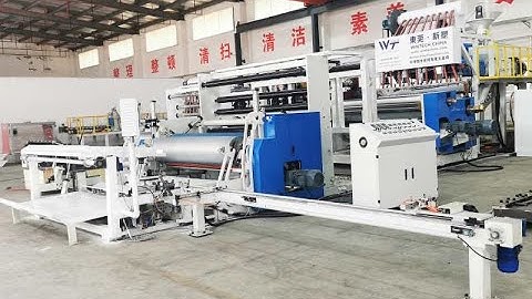 Automatic stretch film machine with automatic core loading & unloading system