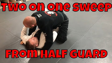 Two on one sweep from half guard