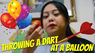 Throwing A Dart At A Baloon Challenge Mae Channel