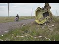 MH 17: onderzoek op het rampplek. Juli 2014