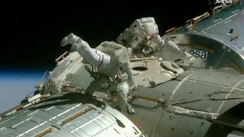 NASA astronauts ISS spacewalk to prepare docking ports