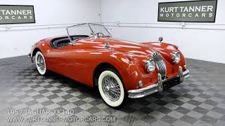 1957 JAGUAR XK140 ROADSTER. OTS. CARMEN RED WITH ORIGINAL BLACK LEATHER TRIM, BLACK TOP/SIDESCREENS