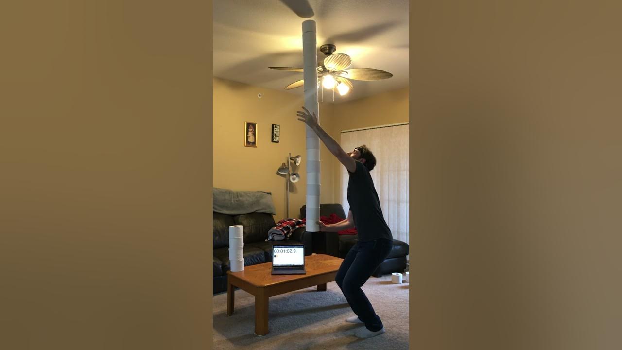 The World Record For The Tallest Toilet Paper Stack Balanced In 1 Hand