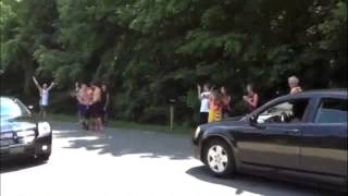 Fans outside LeBron James' home react to his decision to return to the Cleveland Cavaliers