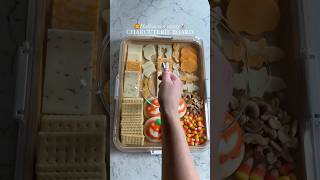 Love this travel charcuterie board and mini Halloween cookie cutters #charcuterie #halloweenparty