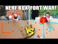 WORLDS BIGGEST BOX FORT NERF WAR! 1v1 NERF BATTLE!