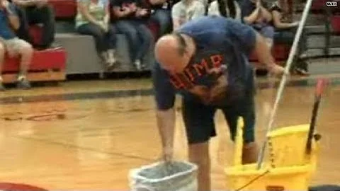 School surprises janitor with $$