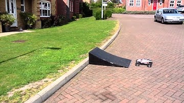Traxxas Rustler Backflips Up  Ramp