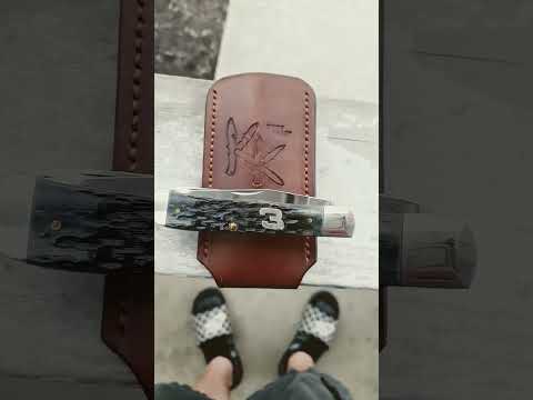 case xx  Dale Earnhardt trapper  And a custom leather slip    