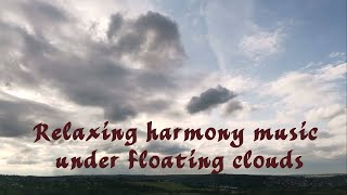 Relaxing harmony music under floating clouds.