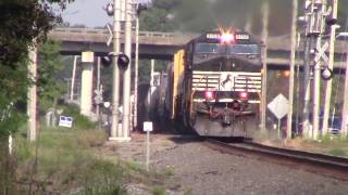 NS E49 with the Highball Two C44-9Ws & a ballast cleaner machine in tow