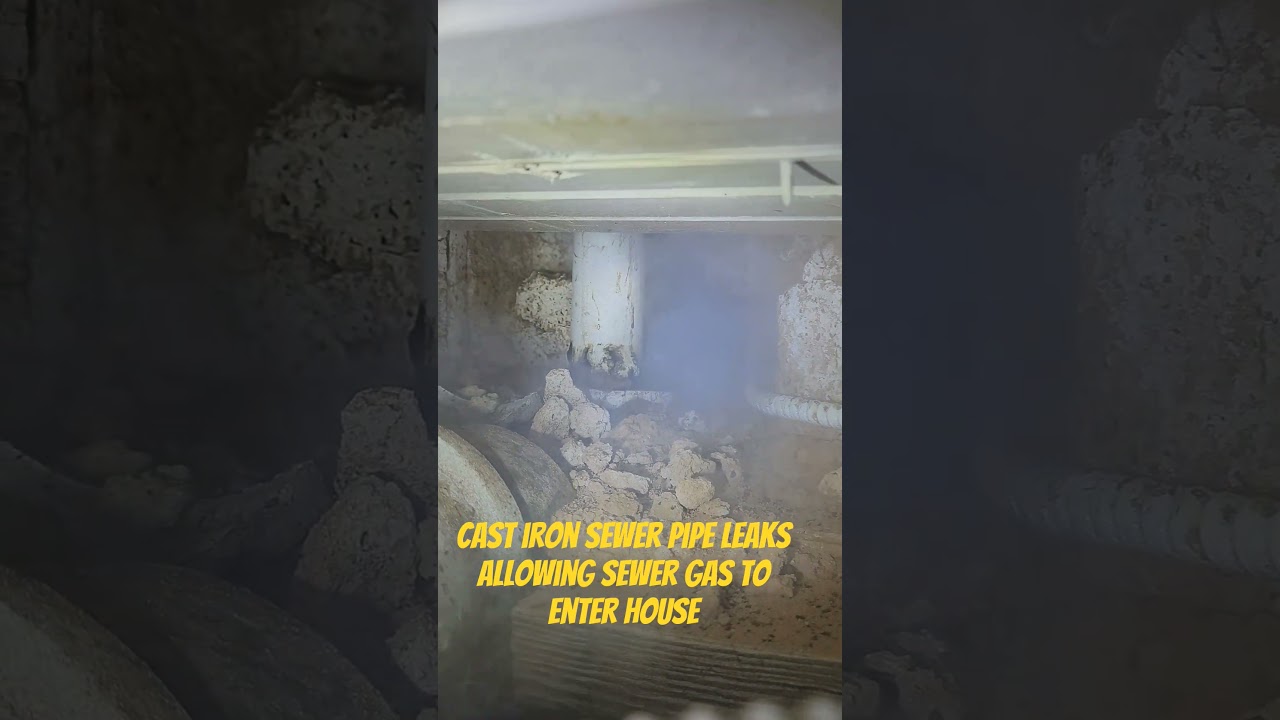 Cast iron sewer pipe leaks allowing sewer gas to enter house. 