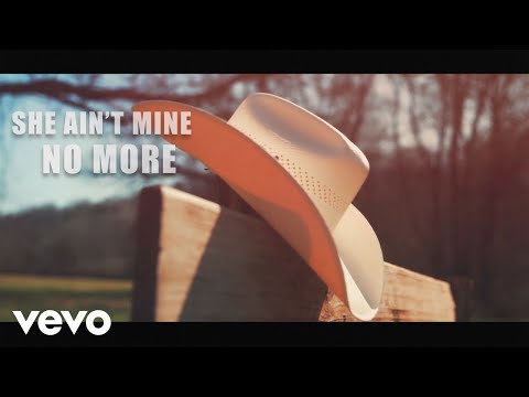 Justin Moore - She Ain't Mine No More (Lyric Video)