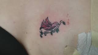 Small Bird On Female Left Breast Tattoo By Boris Kuryakin March 28, 2018.