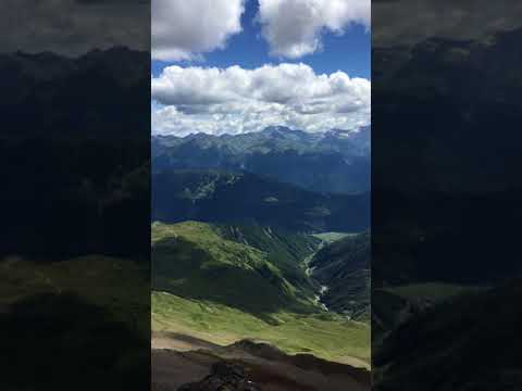 View on Mestia valley (მესტია) from the slope near Gul 2 in Georgia during a trail run