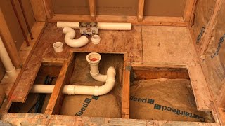 Shower Drain Relocation & Solid Surface Curbless Shower Base Installation @DIY Boomers