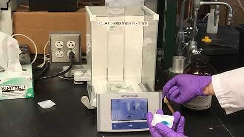 Weighing the sample for use in the TGA