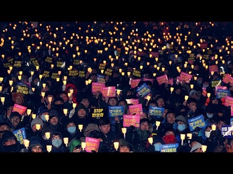 1년 전 '멘붕'이던 12.19...촛불 든 2만여명 "민주주의가 이긴다"