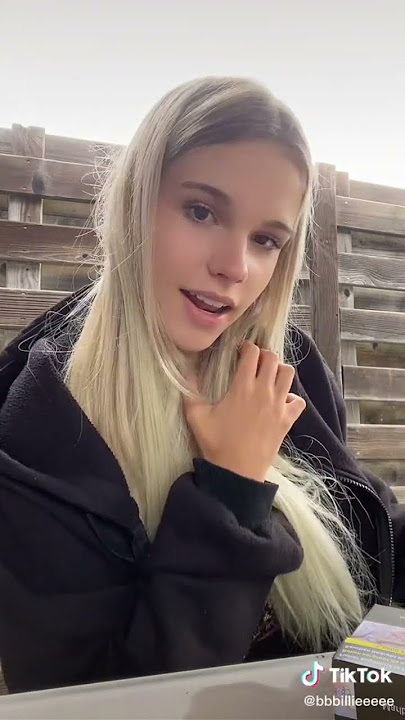 Beautiful young girl smoking cigarette