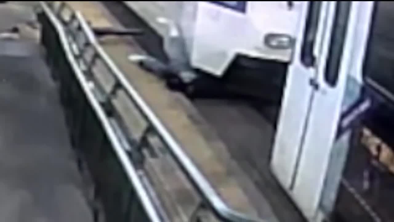 Denver man alive after being dragged under light rail train - YouTube
