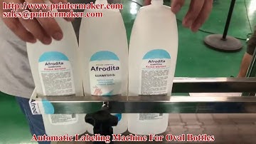 Automatic labeling machine for oval bottles