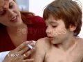 Nice Nurse Gives Vaccination to a young boy.