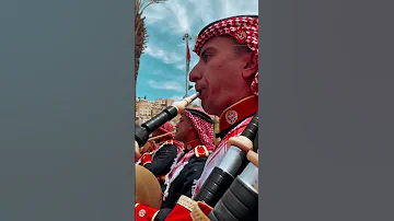 موسيقات القوات المسلحة تعزف أثناء فعالية رفع العلم على السارية الجديدة في ساحة أمانة عم ان 
