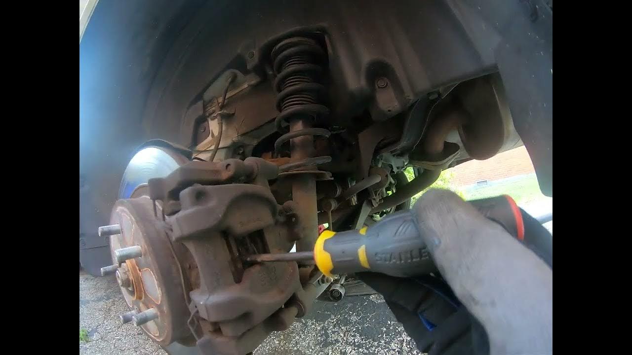 Subaru electronic rear brake caliper how to compress / release YouTube