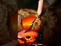 A knife slicing through a crust, with ceramic cracking and metallic scraping sounds, molten lava bub