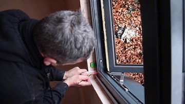 Aluminium window installation in a garden room