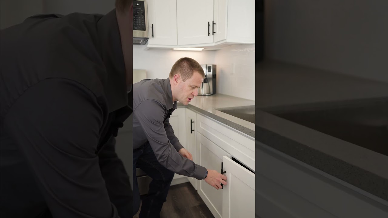 Water Damage causes under a kitchen sink 
