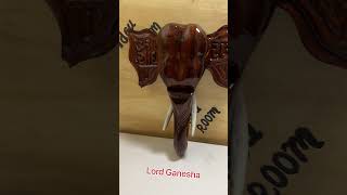 Homemade wooden statue of lord Ganesha.