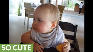 Cute baby falls asleep while eating