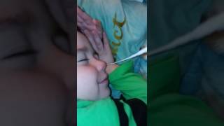 Tickling Angels Nose To Wake Him Up