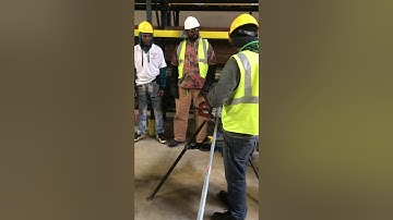 Teaching how to properly use a hacksaw.