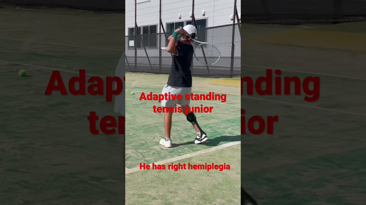 Adaptive standing tennis junior. He has right hemiplegia.