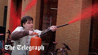 video: Gaza war protesters spray Labour HQ with red paint