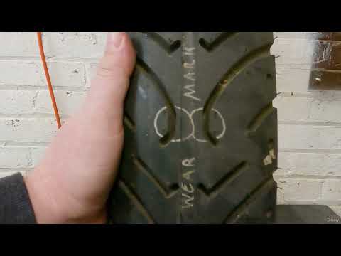 Check the tread depth on your motorcycle.