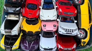Box Full of Model Cars /Ferrari LaFerrari, Mercedes SLS, Pagani Huayra, Rolls Royce Phantom