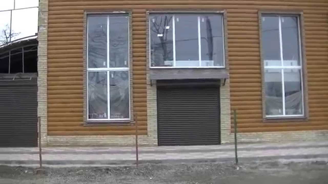 Вариант недорого фасада кирпич+ металлический сайдинг.