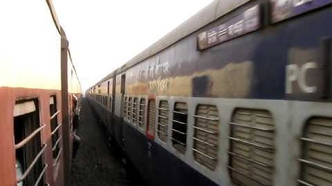 Parallel action in SER-12814 Dn Steel Superfast Express beats EMU