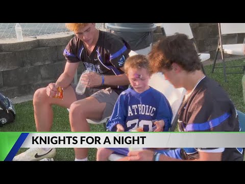 Lexington Catholic High School's football team gets a little bit bigger for a (K)night