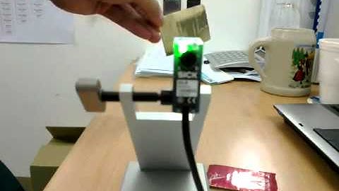 SICK Photo sensor G6 Retro reflective GL6 against Gold shiny surface