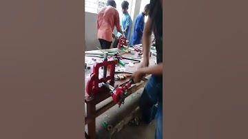 g i pipe threading..  training a student. in skill training centre