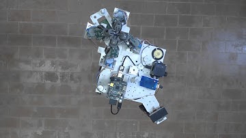 Open-loop Control Moment Gyros yaw maneuver of a small suspended platform simulating a satellite