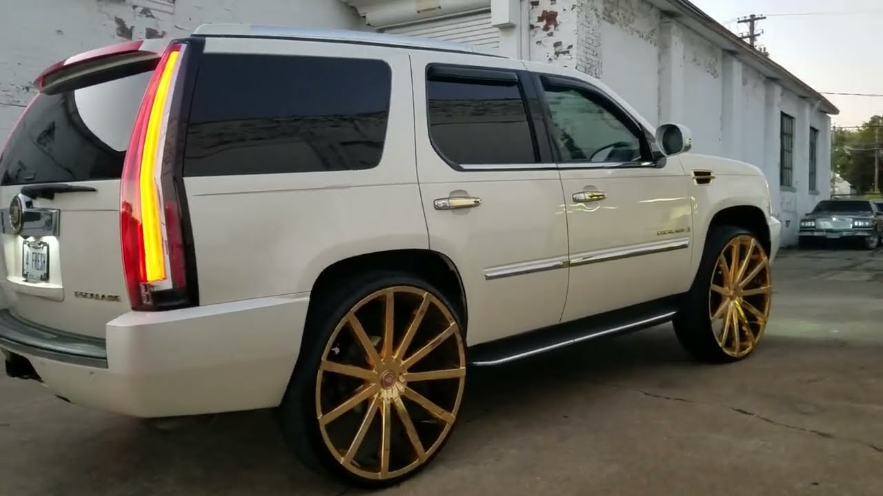 Cadillac Escalade on 30 inch gold starr wheels - YouTube.