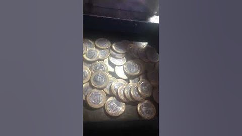 Fábrica de moedas de 1-Real na comunidade da vila Kennedy C.V