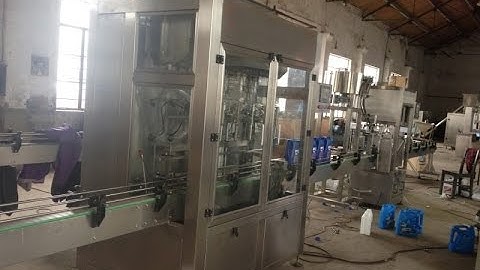 Automatic gravity flowing type liquid filling line linear 12 nozzles overflow filler capping machine