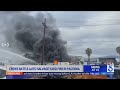 Crews battle auto salvage yard fire in Pacoima